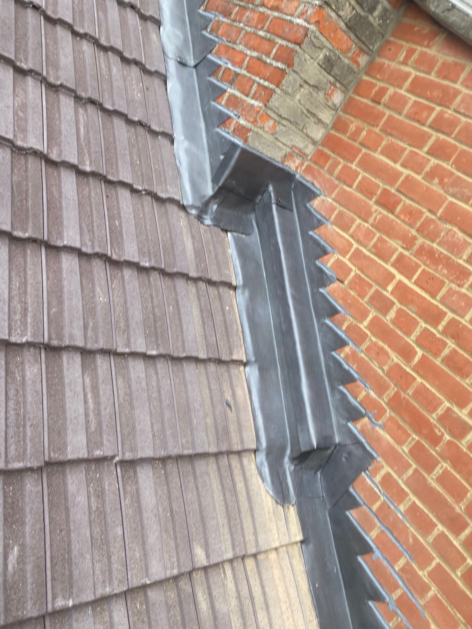 Lead flashing detail on tiled roof
